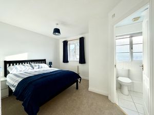 Bedroom One- click for photo gallery